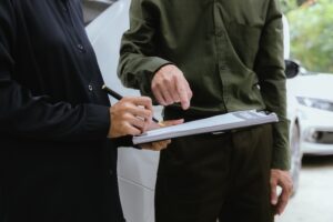 Car accident claim process guide with Mogy Law Firm attorney explaining steps to North Carolina accident victim