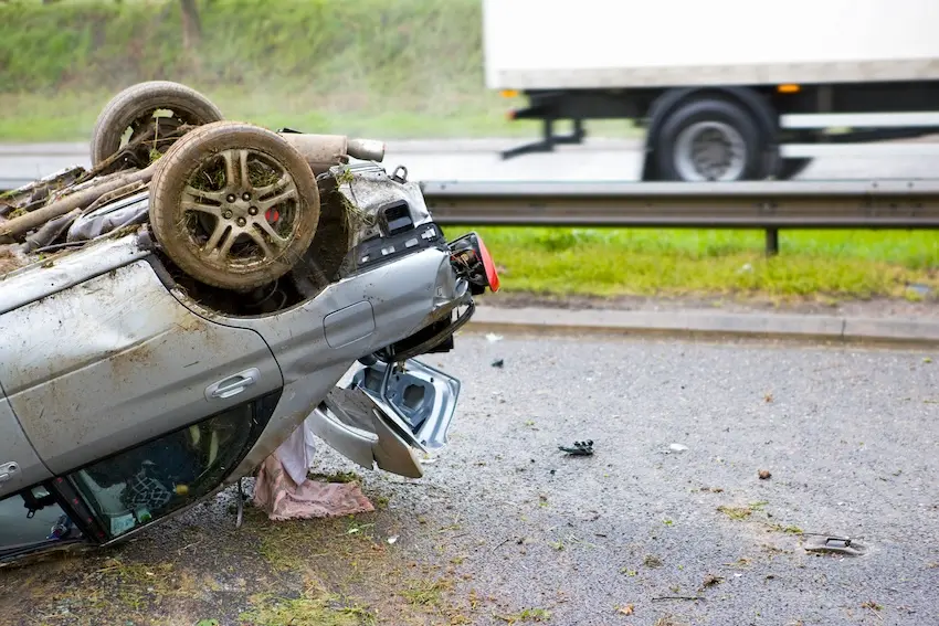 A commercial truck involved in a crash on a North Carolina highway with emergency responders at the scene