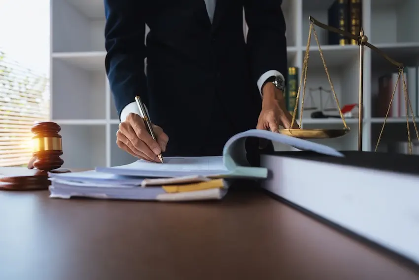 Mogy Law car accident lawyer reviewing an intersection accident claim and legal defense options for a North Carolina client
